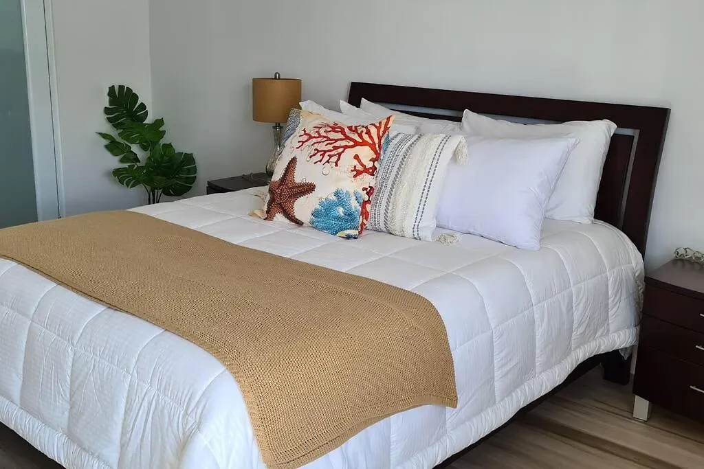 Lagoon-Front Escape Steps Away From The Beach! San Juan Apartment