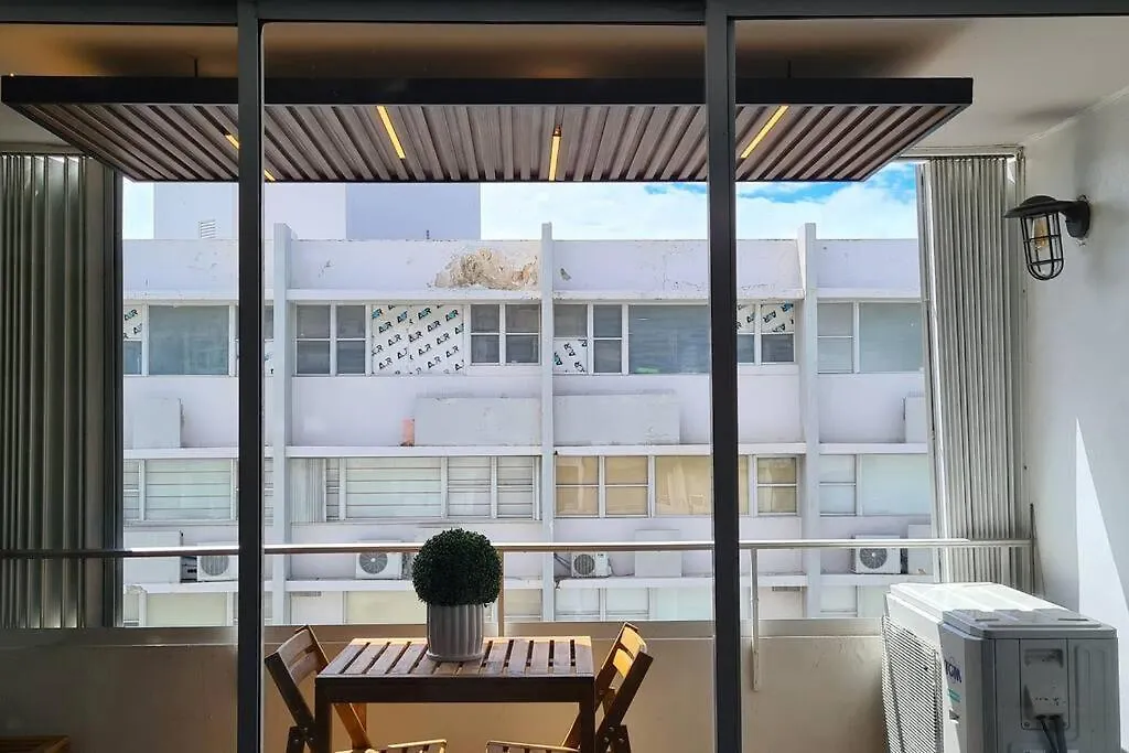 Lagoon-Front Escape Steps Away From The Beach! San Juan Apartment
